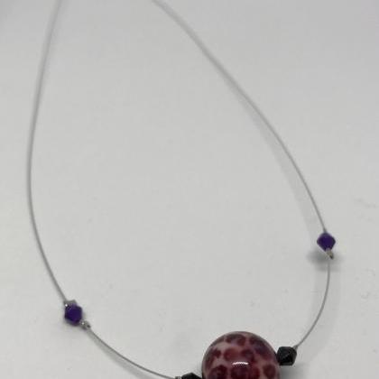 - Beautiful Purple Animal Print Style Bead..