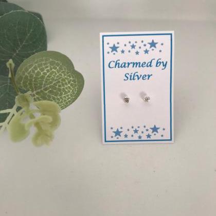 Sterling Silver Circle Cubic Zirconia Stud..