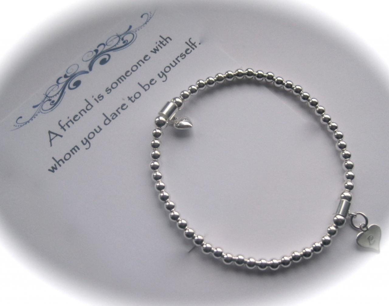 Serenity Friend - Sterling Silver puffed heart and stamped heart charm Stretch Bead Bracelet