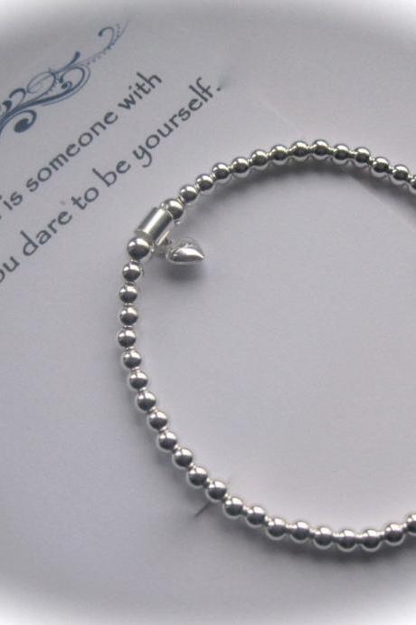 Serenity Friend - Sterling Silver puffed heart and stamped heart charm Stretch Bead Bracelet